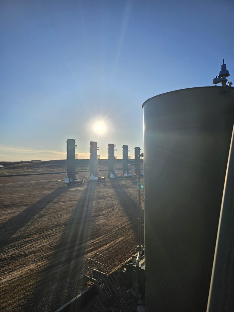 Tank battery and production equipment at an upstream oil and gas site
